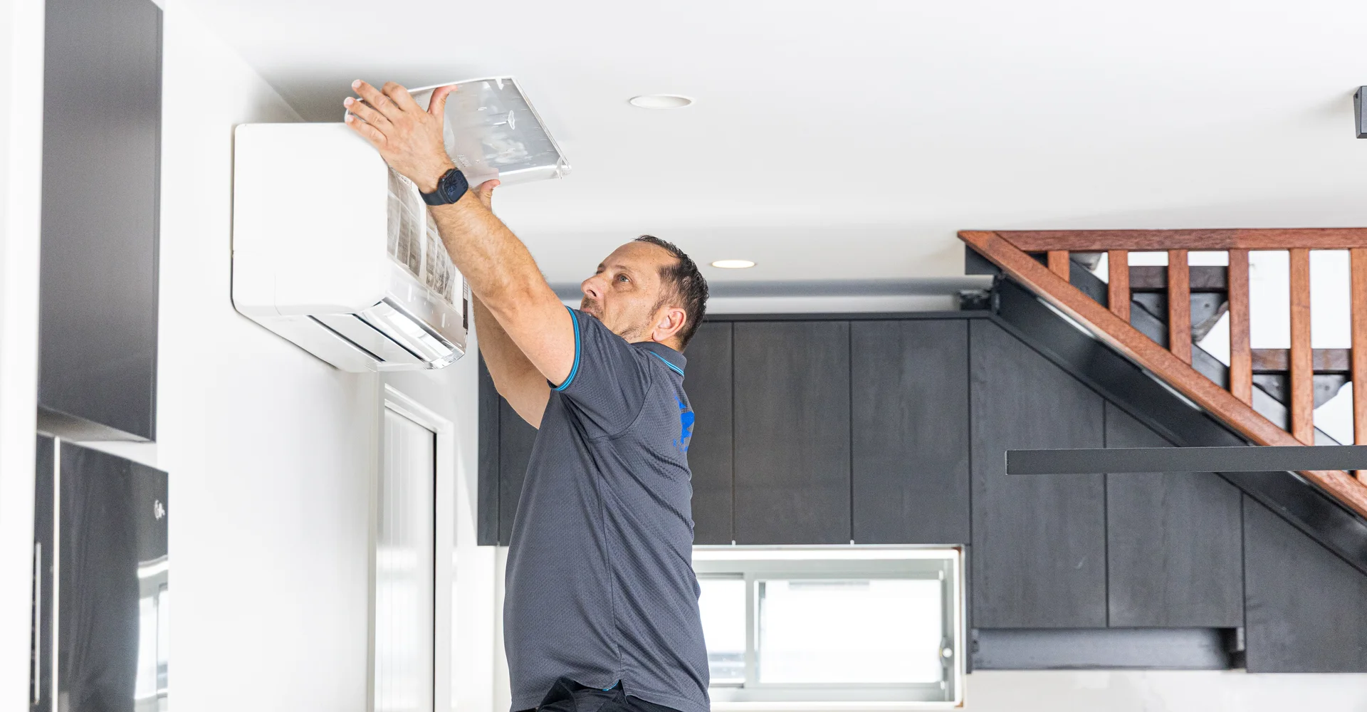 Air conditioning technicians completing a home installation